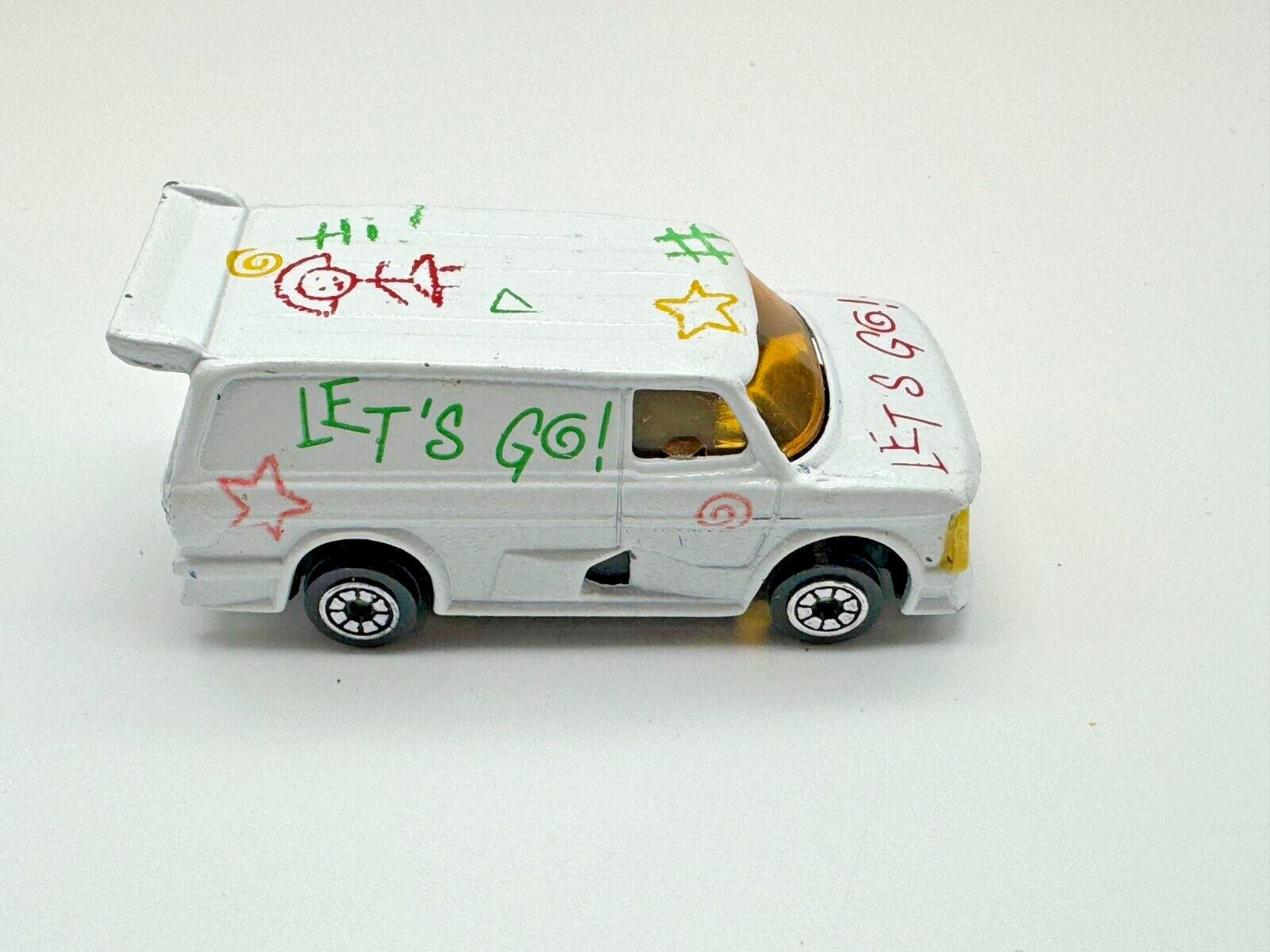 Vintage 80's Diecast White Ford Super Van "Let's Go!" with Crayon-style designs