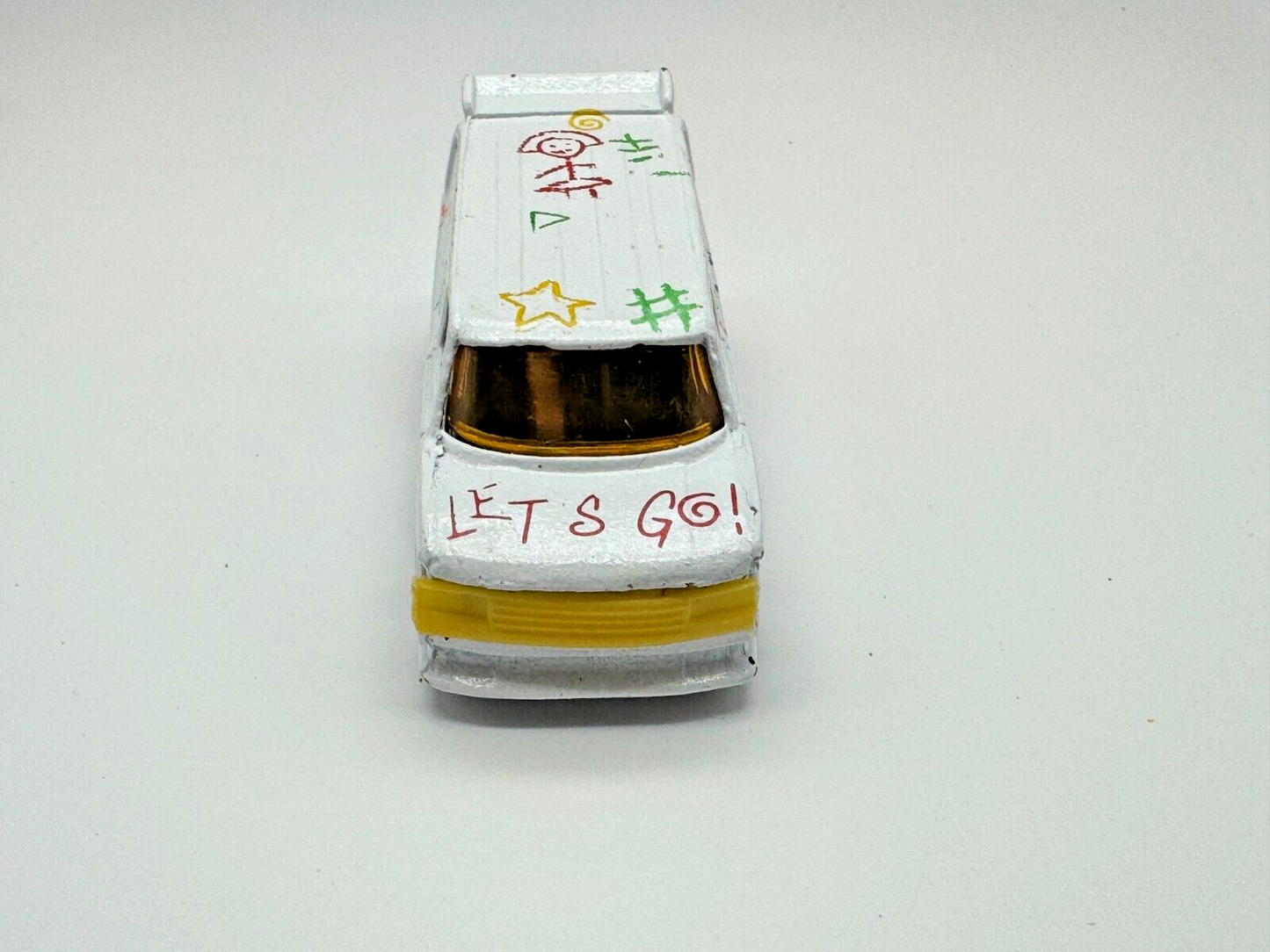 Vintage 80's Diecast White Ford Super Van "Let's Go!" with Crayon-style designs